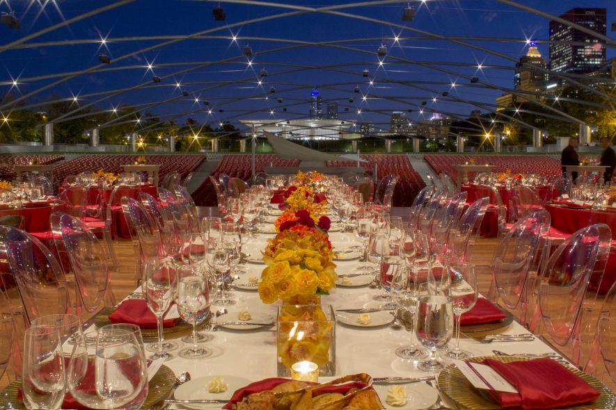 long view of a table set for a fundraiser